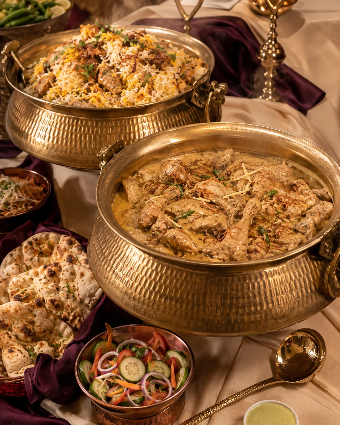 Catering handi pots with biryani and rezala